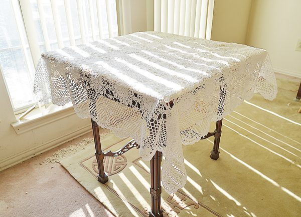 White color, crochet square table topper. 45"square.